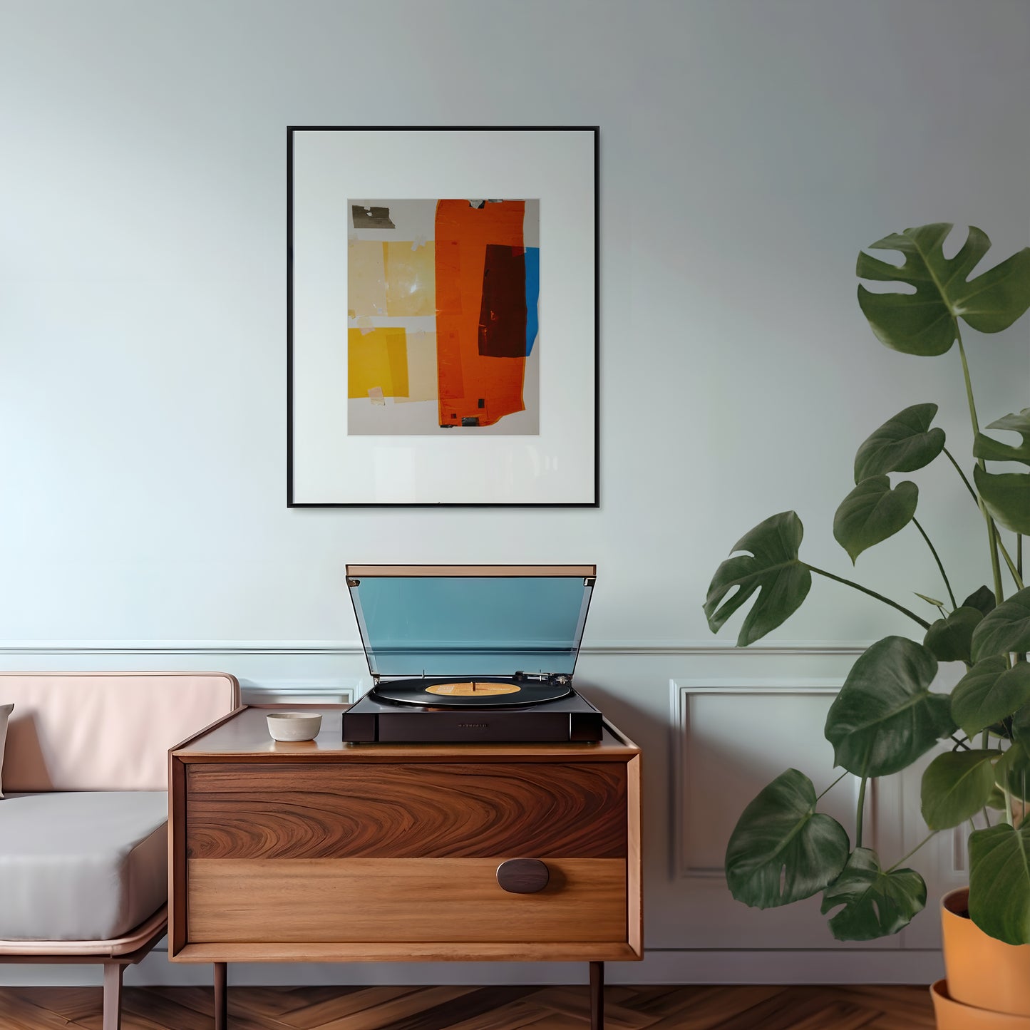 Black metal framed poster print of colourful filters hanged in a nicely decorated room