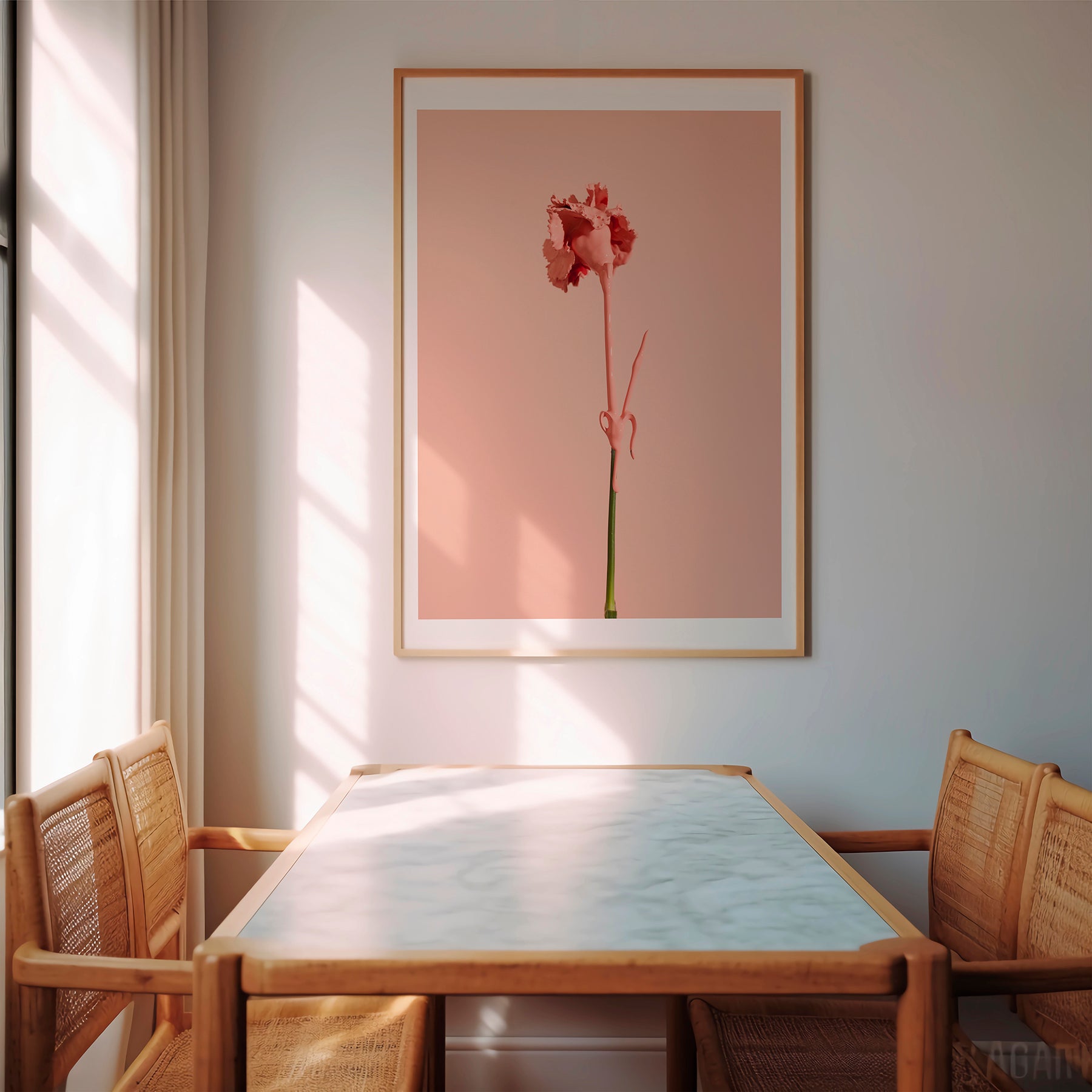 Wooden framed poster of a pink carnation flower hanged in a room